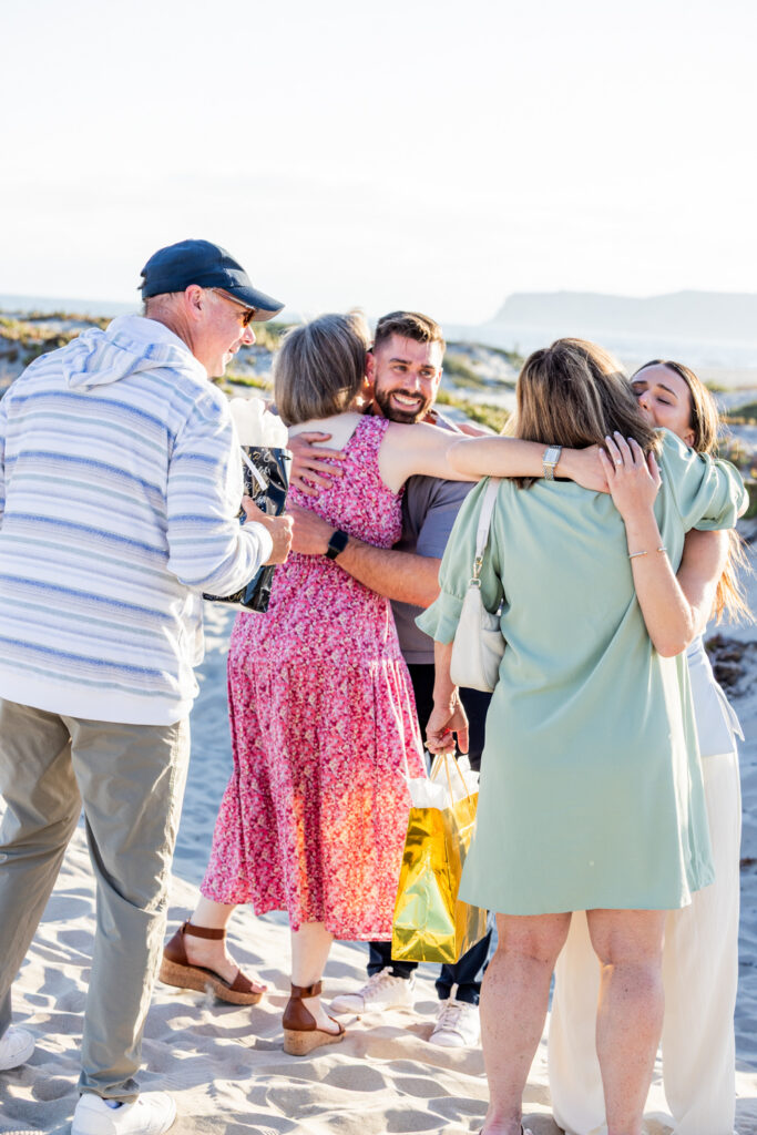 Coronado Beach Proposal Photographer | CJ + Veronica's Surprise Family Reveal san diego proposal photographer 5